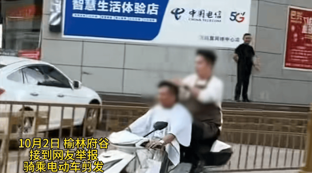 陕西一男子骑电动车时不停理发<strong></p>
<p>莱特币交易所</strong>,被罚款500元、驾驶证记9分;民警呼吁公众注意电动车出行安全